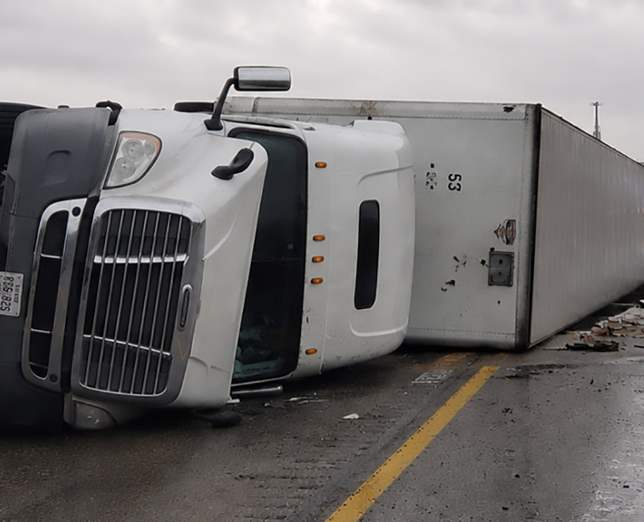 Tractor trailer roll over accident recovery service in San Bernardino